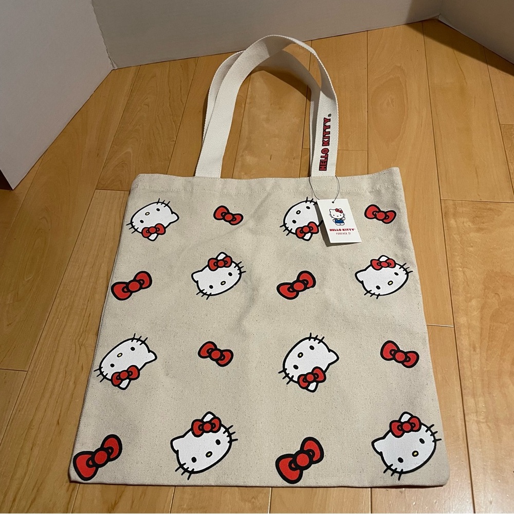 NWT hello kitty canvas bow/faces tote
